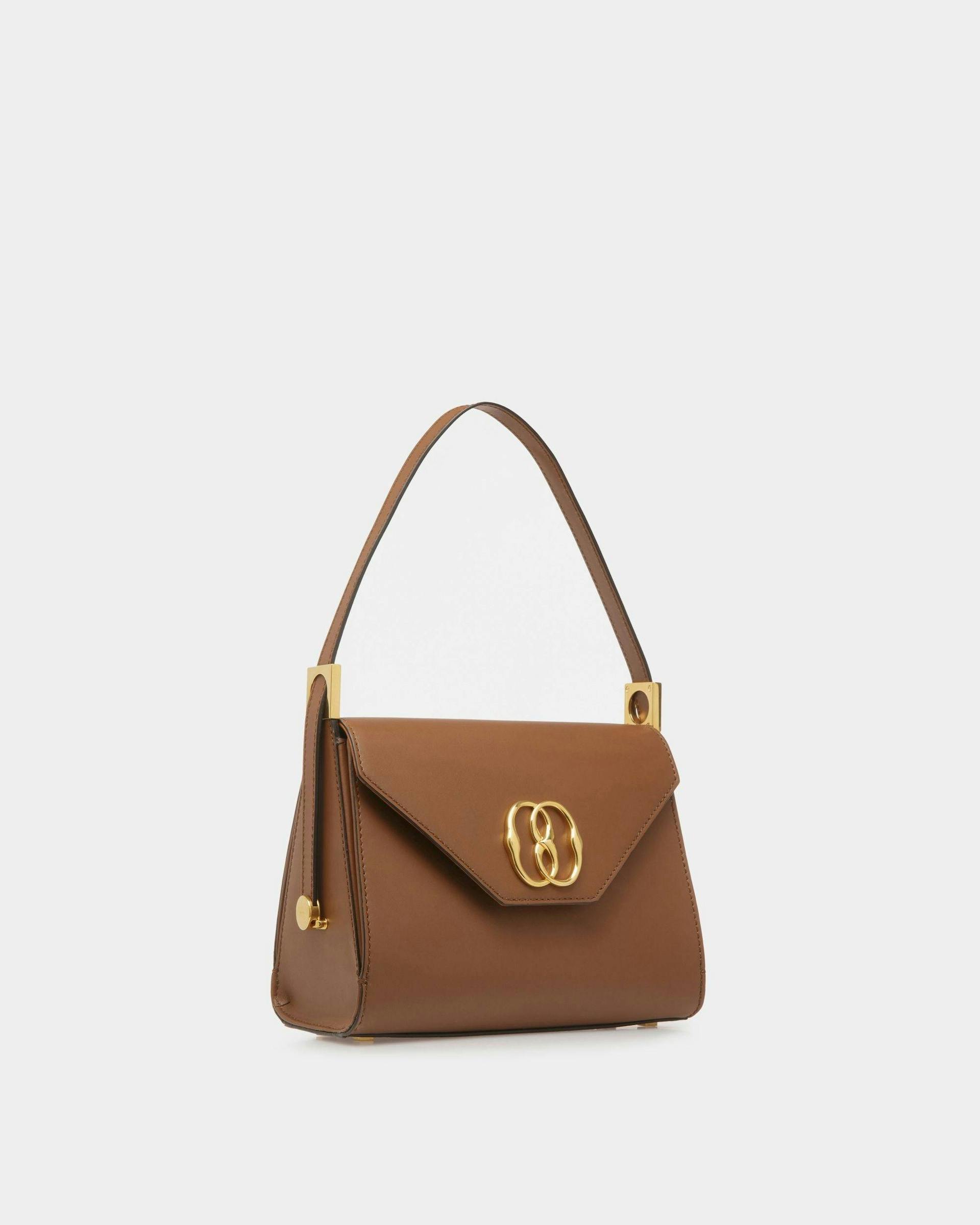 Women's Emblem Top Handle Bag In Brown Leather | Bally | Still Life 3/4 Front