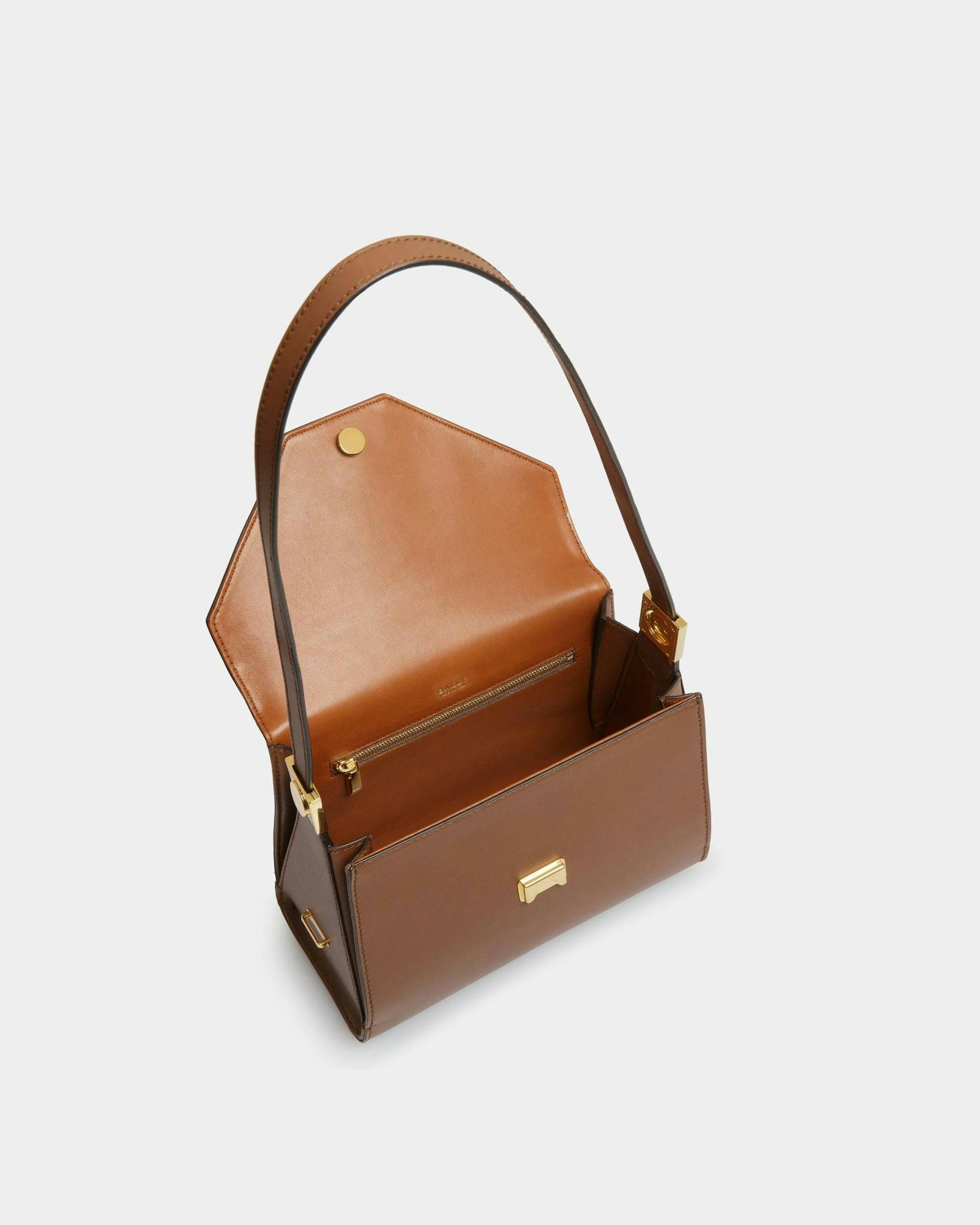 Women's Emblem Top Handle Bag In Brown Leather | Bally | Still Life Open / Inside