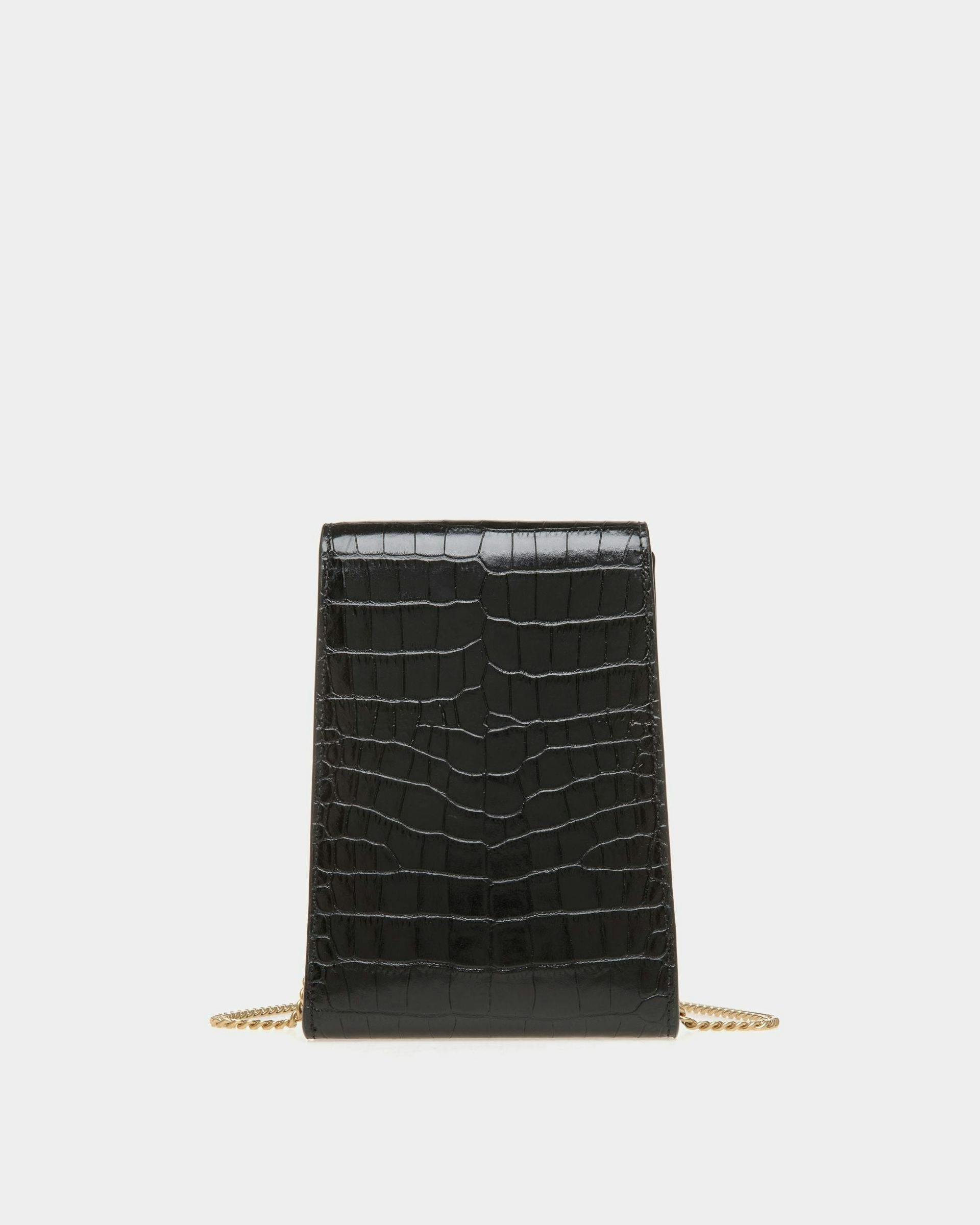 Women's Tilt Phone Bag in Black Crocodile Print Leather | Bally | Still Life Back
